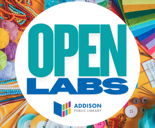 open labs text over an assortment of craft supplies