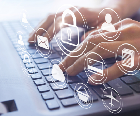 hands typing on keyboard with illustrated hovering icons of common security symbols: lock, email, credit card, person