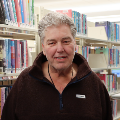 headshot of board member angelo sellas