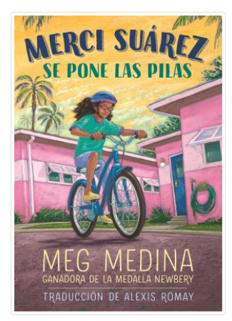 Image shows young brown girl on her bicycle as she rides through pink houses in the background.
