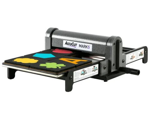 Photo of the AccuCut die cutter. A machine that cut outs shapes into paper. 