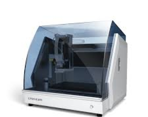 Photo of Makera Carvera. It is an enclosed CNC machine for milling wood, plastic, and metal.